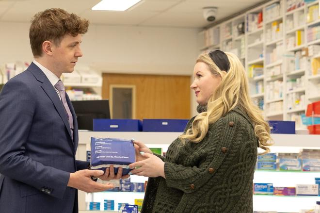 Irish patient receiving a prescription in pharmacy